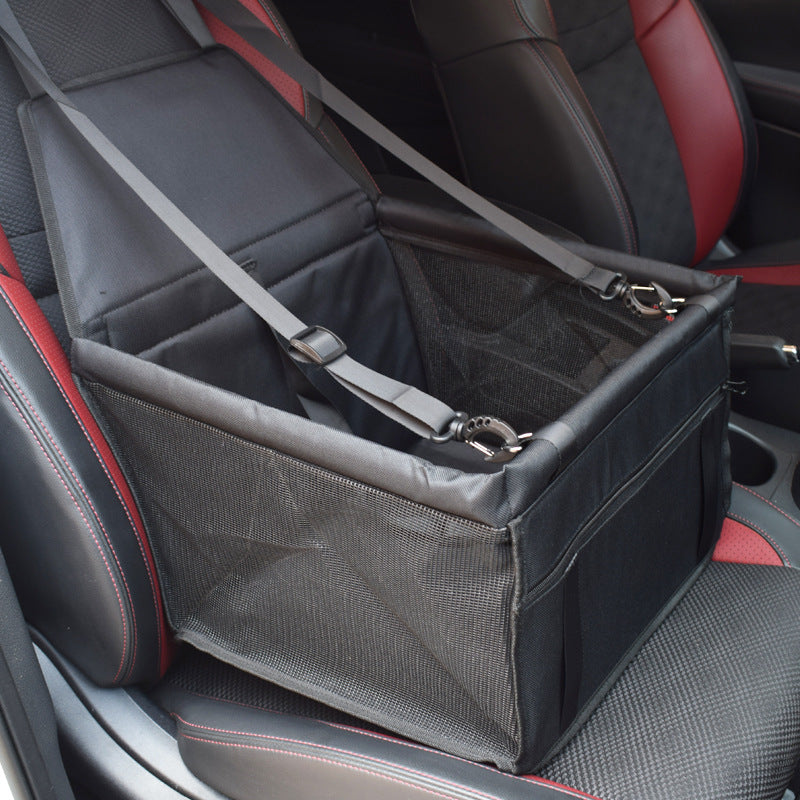 Pet car seat cover with a mesh compartment on a car seat