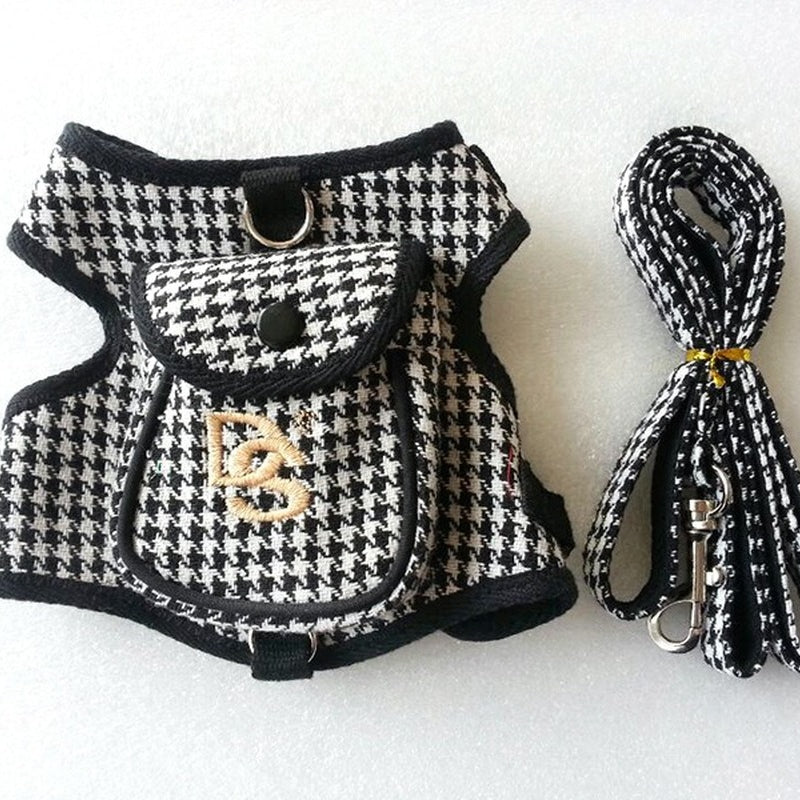 Houndstooth patterned dog harness and leash set on a white background